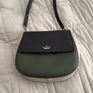 Kate Spade crossbody bag with adjustable strap.